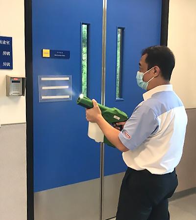 Mr. Kan spraying Germagic anti-microbial coating.